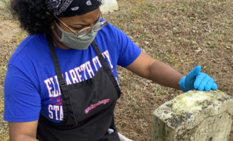 Headstone cleaning at Oak Grove Cemetery 